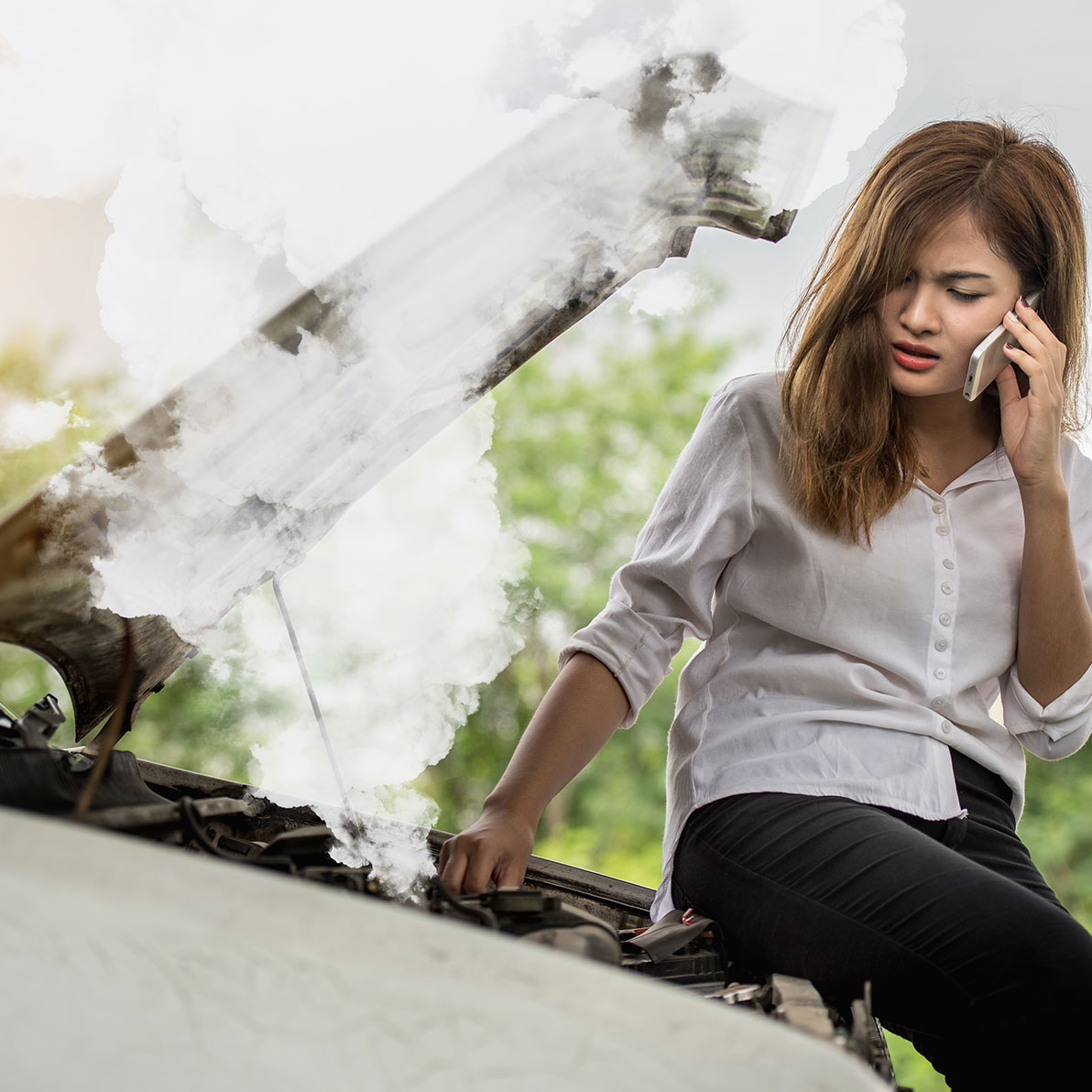 Woman Sitting on Her Broken Car - Example of Defective Automobile